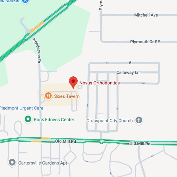 Map view pinning Novus Orthodontics near Sixes Tavern, with nearby Piedmont Urgent Care and Rock Fitness Center; major roads include Old Mill Rd and Henderson Dr.